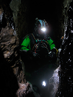 hiker with a head lamp